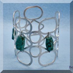 J15. Silvertone and turquoise cuff bracelet - $14 